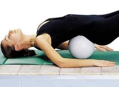 Practice with a roller in the lower back of the back
